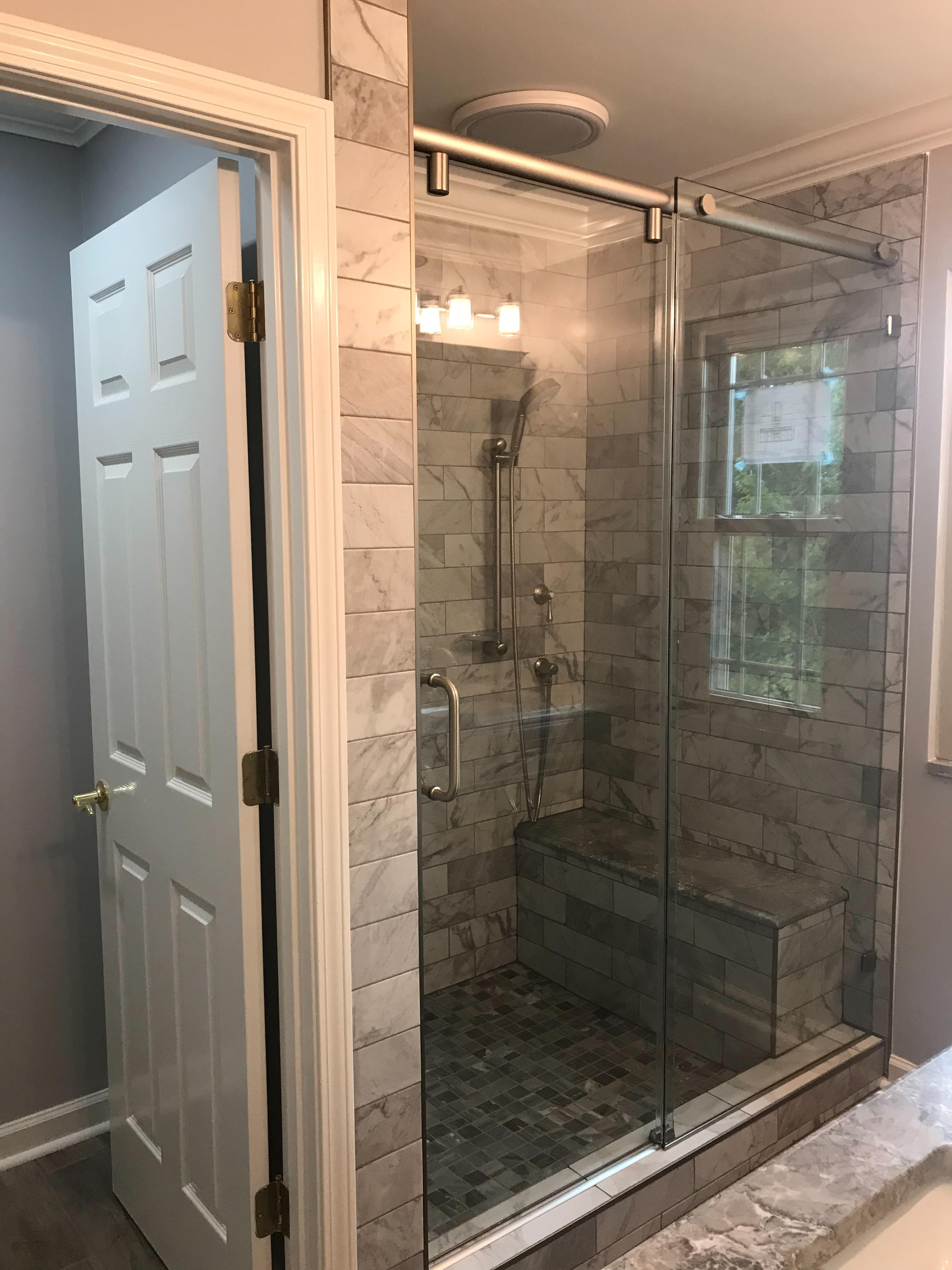 Modern looking shower with sliding glass
